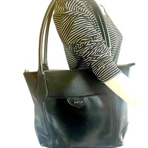 Lodis shoulder bag purse in black pebble leather with zip bottom for luggage